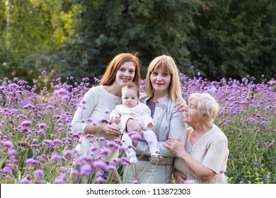 Four Generations Of Women In A Beautiful Lavender Field