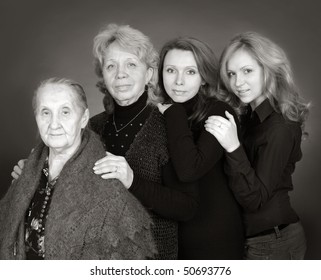 Four Generations Of Women In A Family On Black