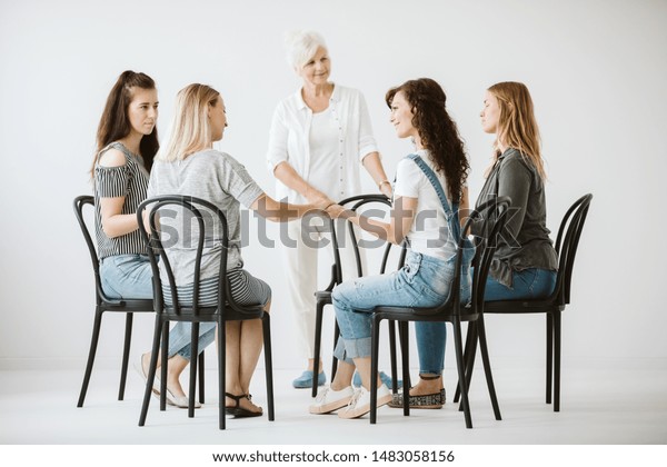 Four Girls Sitting Circle Holding Each Stock Photo (Edit Now) 1483058156