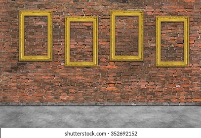 Four Golden Frames On Brick Wall