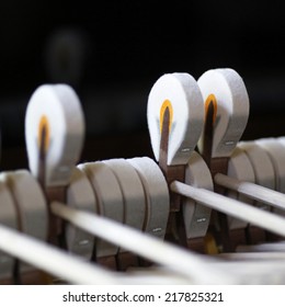 Four Hammers Of A Steinway Grand Piano Forming A Chord