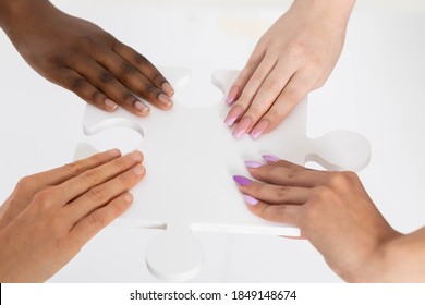 Four Hands Of Different Skin, Symbolizing The Coexistence Of Many Races And Reconciliation Through The Same Genetic Code And Common Purpose On Earth.