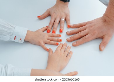 Four Hands Of The Family, Husband, Wife, Daughter And Son