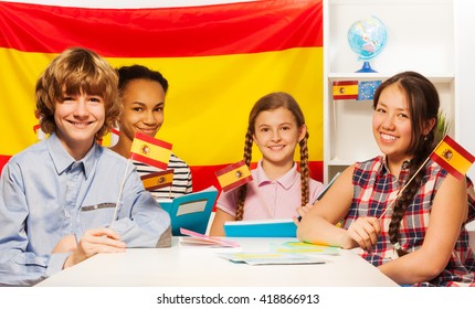 Four Happy Multiethnic Students Holding Flags Stock Photo 418866913 ...