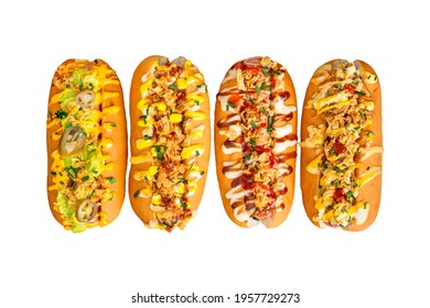 Four hot dogs with many toppings of different flavors isolated on white background, top view  - Powered by Shutterstock