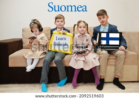 Four kids show inscription learn finnish. Foreign language learning concept. Suomea.