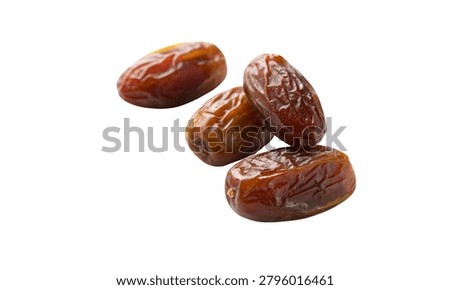 Four Large Medjool Dates Display isolated on white background.