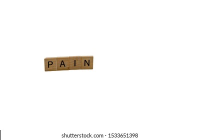 Four Letter Word Pain In Block Letters On White Background