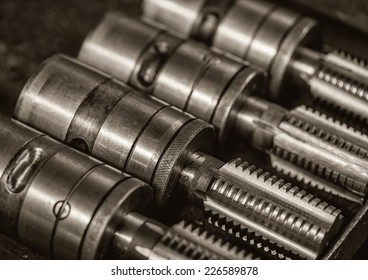 Four machine screw taps