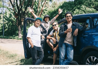 Four male friends having their leisure time on a road trip  - Powered by Shutterstock