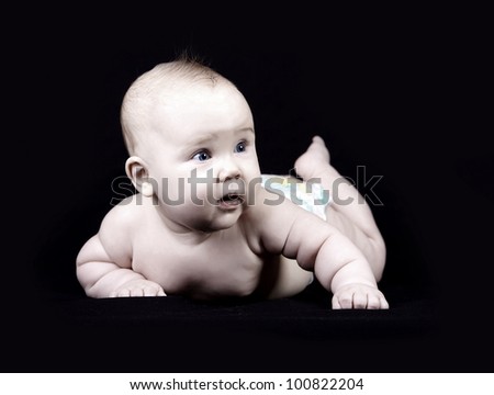 Similar – Baby girl four months old having her bath