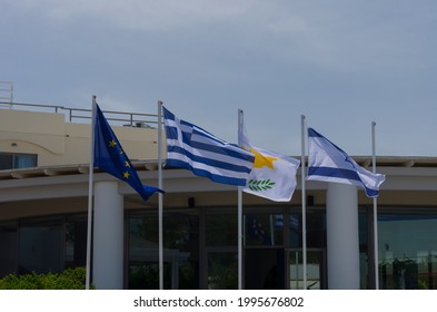 Four national flags with symbols of the European Union, Greece, Cyprus and Israel - Shutterstock ID 1995676802