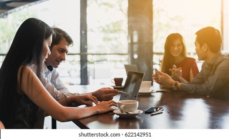 Four People Meeting And Discuss In Coffee Shop, Freelance Work Style, Outdoor Business Meeting