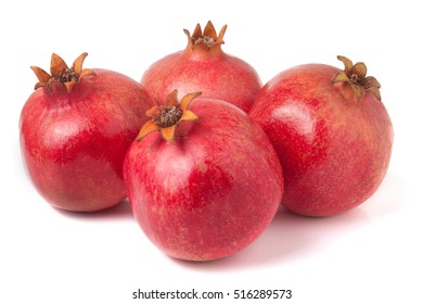four pomegranate isolated on a white background - Shutterstock ID 516289573