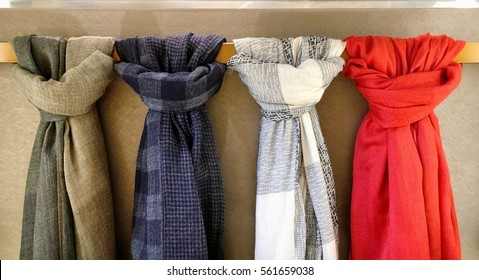 Four Scarves Tied On The Hanging Bar