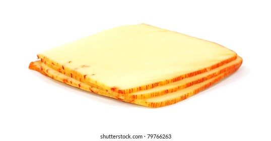 Four Slices Of Muenster Cheese On A White Background.