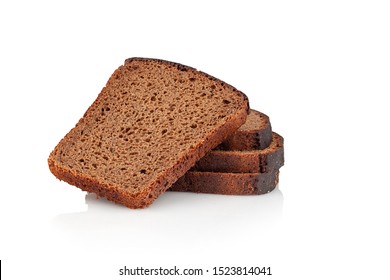 four slices of rye bread on a white background