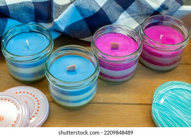 Four Striped Candles. In Blue-white And Pink-white. With Wooden Wick And Cotton Wick. Closeup