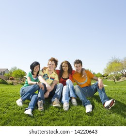 Four Teens Hang Out In A Park