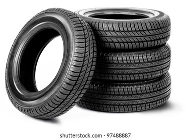 Four Tires On The White Background