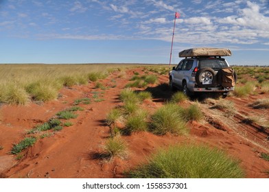 Four Wheel Drive Vehicle Picking Way Through The Multiple Red Dirt Tracks Of The Canning Stock Route Western Australia 