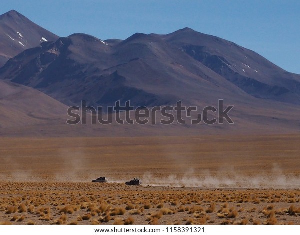 Four wheeler cars drive off-road on plato\
Altiplano, Bolivia, November 09,\
2017