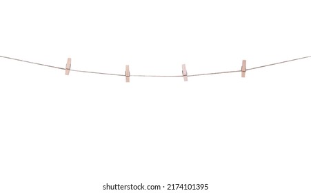 Four wood clothes pegs patterns hanging on brown string isolated on white background , clipping path