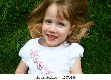 Four Year Old Girl Laying Grass Stock Photo 12376288 | Shutterstock