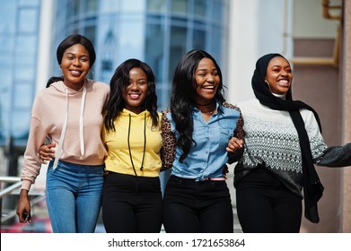 Four young college african american woman friends spend time together. - Shutterstock ID 1721653864