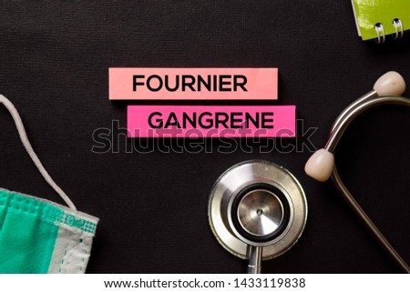 Fournier Gangrene on top view black table and Healthcare/medical concept.