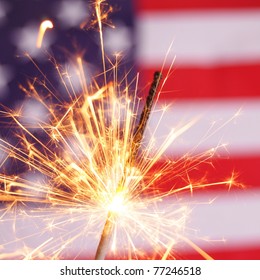 Fourth Of July Concept With Sparkler And Usa Flag