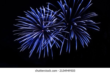 Fourth of July fireworks celebration with blue fireworks