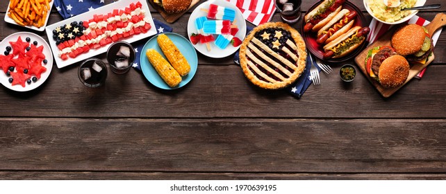 Fourth Of July, Patriotic, American Themed Food. Overhead View Top Border On A Dark Wood Banner Background. Copy Space.