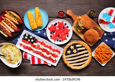 Fourth Of July, Patriotic, American Themed Food. Above View Table Scene On A Dark Wood Background.