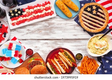 Fourth of July, patriotic, American themed food. Overhead view frame on a white wood background. Copy space. - Powered by Shutterstock