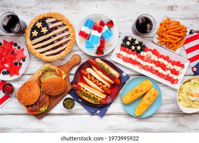 Fourth Of July, Patriotic, American Themed Food. Overhead View Table Scene On A White Wood Background.