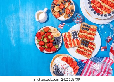 Fourth of July, Patriotic Independence day desserts.  4th of July sweet brunch food and snacks - toast sandwiches, flakes with berries, cake, pancakes, champagne with glasses, holiday decor, flags  - Powered by Shutterstock