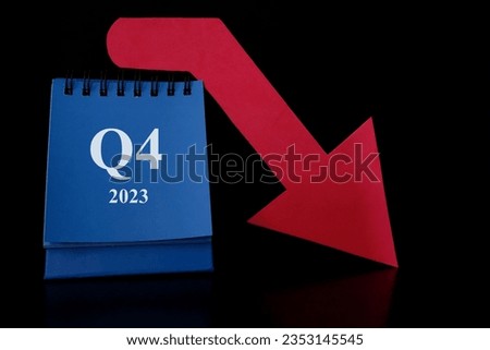 Fourth quarter of 2023 negative performance financial report and fiscal concept. Downward arrow with decreasing coins and calendar in black background.