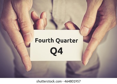 Fourth Quarter (Q4) Of Business - Text On Card Hold By Man 