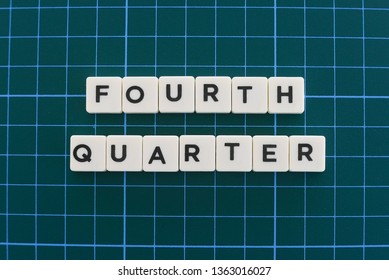 Fourth Quarter Word Made Of Square Letter Word On Green Square Mat Background. 