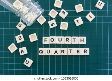 Fourth Quarter Word Made Of Square Letter Word On Green Square Mat Background. 