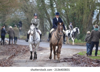 Fox Hunters Ride Along A Street During The Traditional Boxing Day Hunt On December 26, 2013 In Chippenham, UK. Fox Hunting Is Technically Outlawed In The UK With Meets Following Scented Trails.