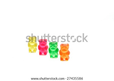 Foyr of colorfoul gummy bears on white background