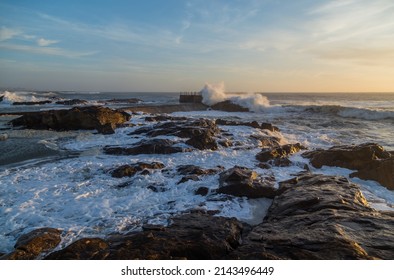 Foz during a storm on the ocean at sunset in Atlantic ocean, Porto, Portugal.