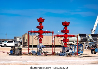 Fracking Well And Oil Pipe Line Valves In Oil Field.