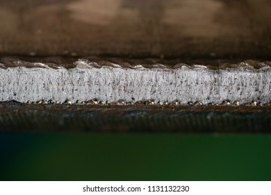 Fracture test of fillet weld exposed welding defects on the fracture, if any. Accumulation of defect greater than the applicable Code causes rejectable of the welding procedure under qualified. - Shutterstock ID 1131132230