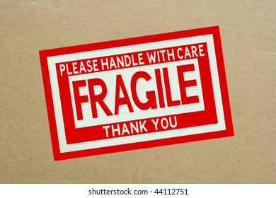 Fragile Handle With Care Sticker On Shipping Box