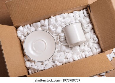 Fragile porcelain in loose white Filler Shipping Packing Peanuts