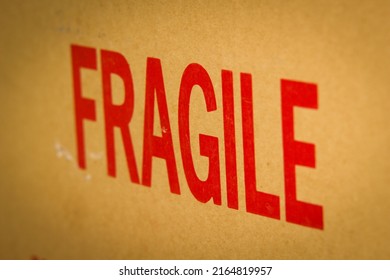 Fragile word print on cardboard box