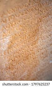 Fragment Of The Ancient Greek Letters Carved On The Stone